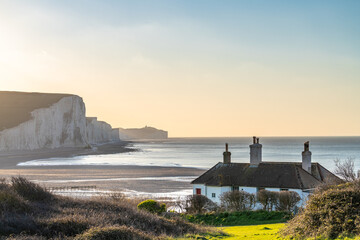 The Coast Guard Cottages & Seven Sisters Chalk Cliffs just outside Eastbourne, Sussex, England, UK