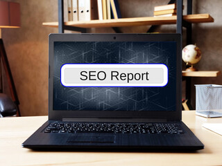 Financial concept about SEO Report  with phrase on the sheet.