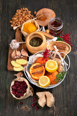 Healthy products for Immunity stimulating and cold remedies on wooden table