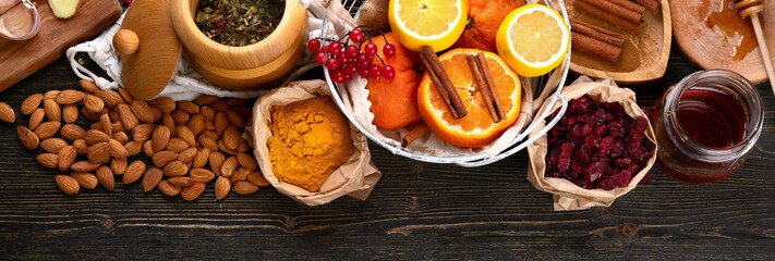 Healthy products for Immunity stimulating and cold remedies on wooden table