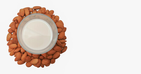  vegetarian milk, almond seed in white background, copy space