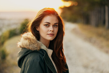 Pretty attractive woman look outdoors on nature background