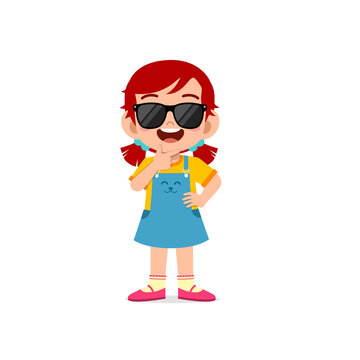 cute little kid girl show cool and wearing black glasses pose expression