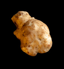 Ginger root isolated on black