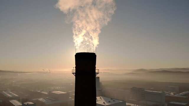 Factory pipe polluting air, environmental problems. Industrial factory pollution, smokestack exhaust gases. Climate change, ecology, atmoshere gas, ozone layer