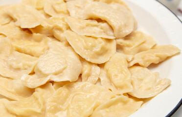 Dumplings cooked in a saucepan.