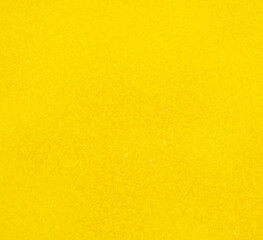 Fototapeta premium Yellow paint on the snow in winter.