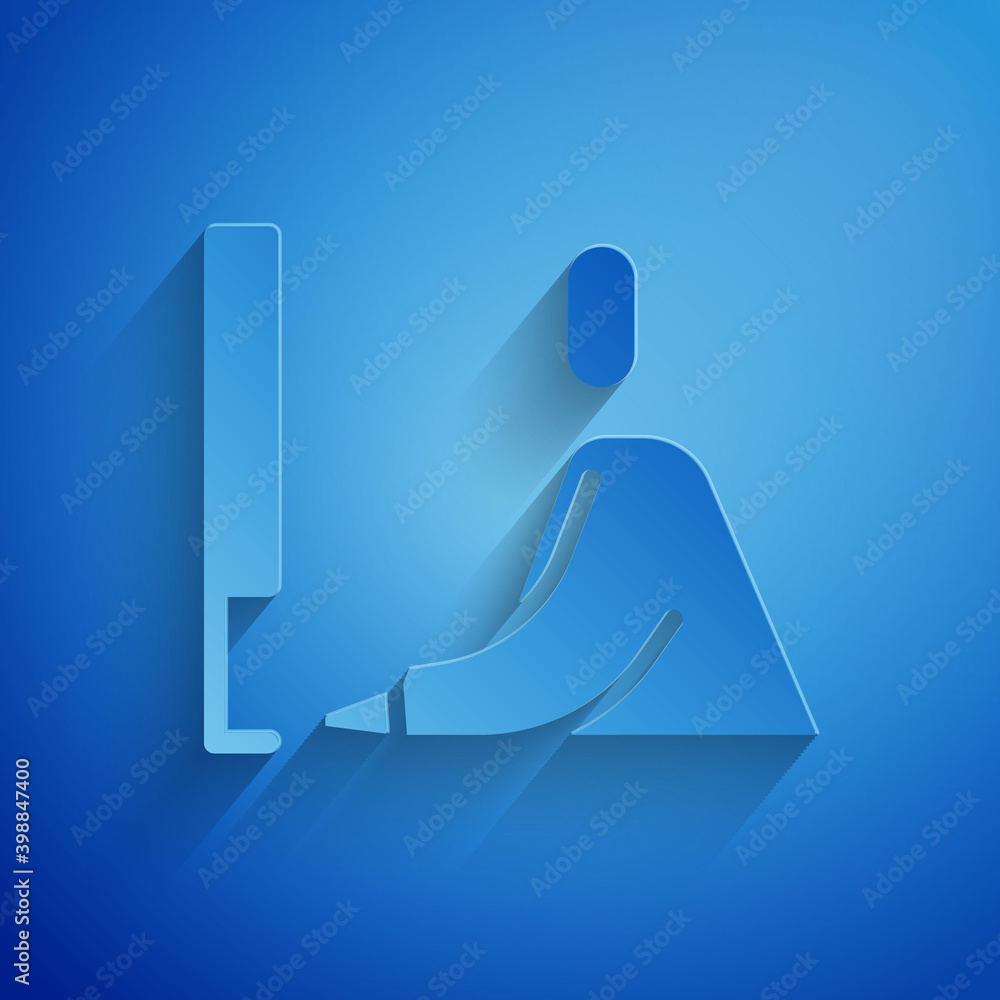 Sticker paper cut student working at laptop icon isolated on blue background. workplace concept. paper art s