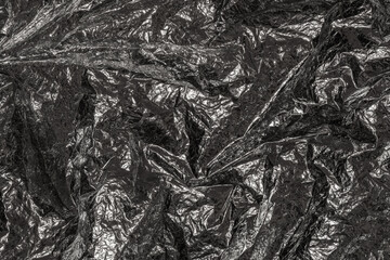 The appearance of space blanket (heat sheet, first aid kit, shock blanket) silver side with a wrinkled texture 
