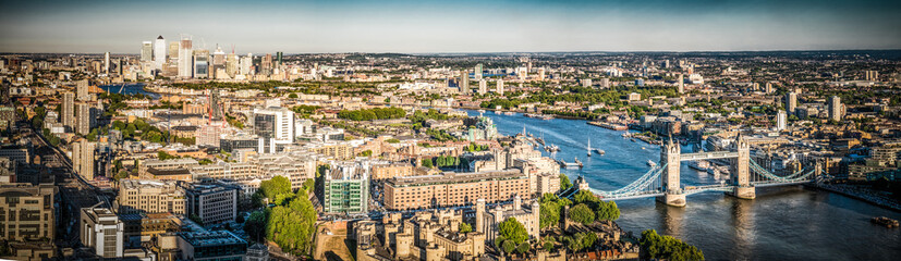 Fototapeta na wymiar Aerial view of London landmarks including Tower Bridge and Canary Wharf