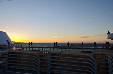 Dream vacation on modern Costa cruiseship or cruise ship liner during sunrise sunset twilight at...