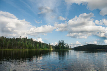 Pistajoki river blue sky clouds sunlight forest rafting North Karelia August 2014