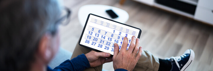 Man Using Calendar Agenda
