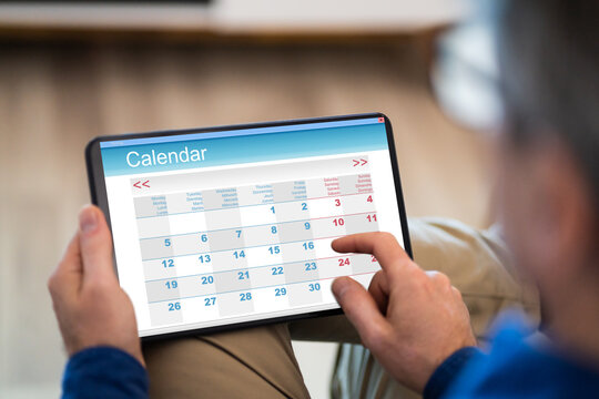 Man Using Calendar Agenda