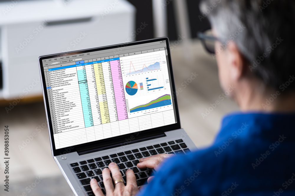 Poster spreadsheet data software reports on laptop