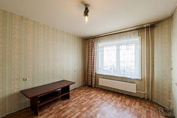 Russia, Moscow- April 17, 2020: interior room apartment shabby old sloppy not modern furnishings. cosmetic repairs required