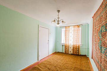 Russia, Moscow- April 17, 2020: interior room apartment shabby old sloppy not modern furnishings. cosmetic repairs required