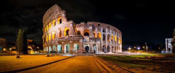 Night time panorama of Colosseum in Rome, Italy