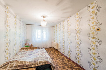 Russia, Moscow- April 17, 2020: interior room apartment shabby old sloppy not modern furnishings. cosmetic repairs required