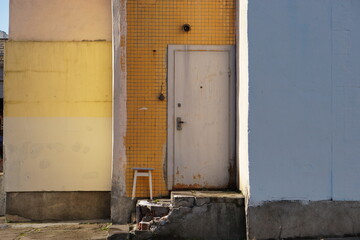 composition of a chair on a wall