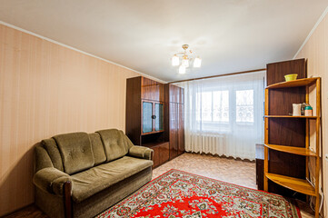 Russia, Moscow- April 17, 2020: interior room apartment shabby old sloppy not modern furnishings....