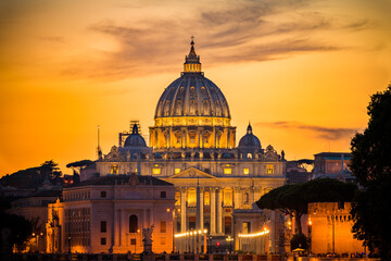 St Peter's basilica in Rome,Vatican, the dome at sunset - obrazy, fototapety, plakaty