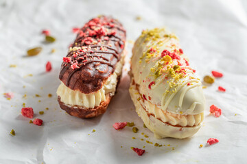 Delicious eclairs as snack made of chocolate