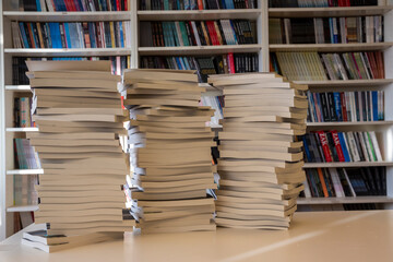 books standing on table in front view