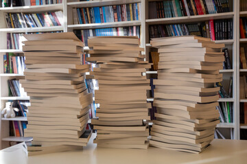 books standing on table in front view