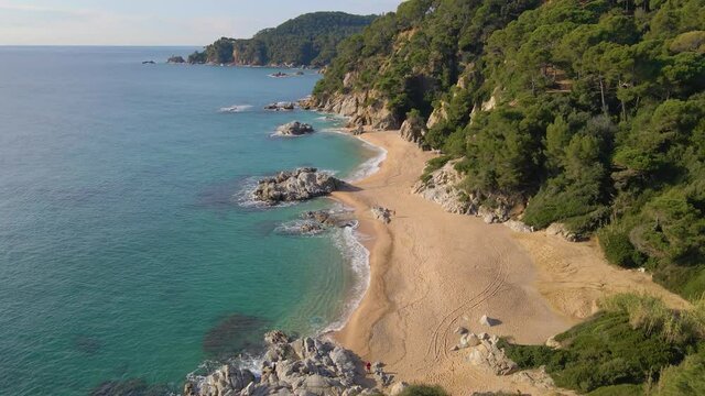 mediterranean beach paradisiaca turquoise blue waters no people aerial view drone spain catalunya costa brava blanes lloret de mar mallorca balearic islands