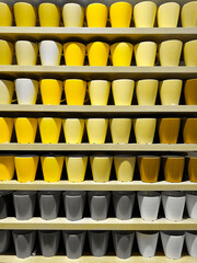 Set of coffee cups of Illuminating and Ultimate gray Pantone color of the year 2021