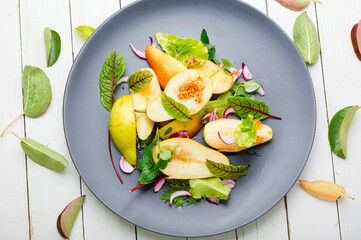 Autumn salad with pear.
