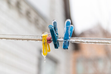 linen dries in winter covered with ice. selective focus.