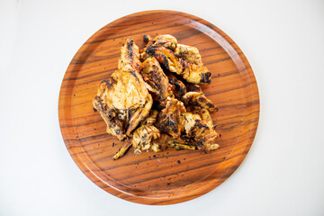 Chicken barbecue on a fried chicken plate, ready to be eaten in a delicious chicken tray