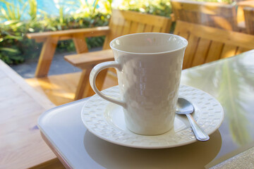 white glass of coffee in coffee shop