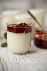 homemade sweet yogurt with fruit jam in a glass