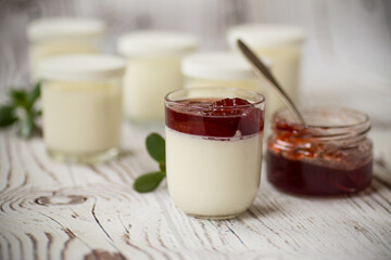 homemade sweet yogurt with fruit jam in a glass