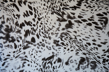 Black and white abstract camouflage. The concealment pattern on a fabric. Conception of winter masking.