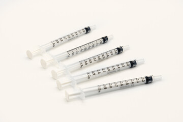 Five Medical Vaccine Syringes  on a white background