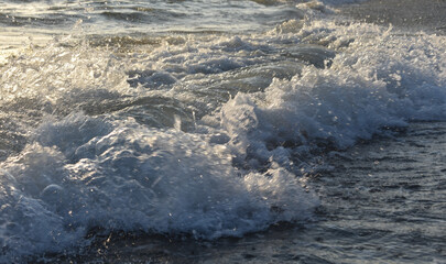 waves foam on the sea