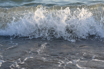 waves foam on the sea