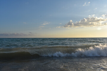 waves on the sea and yellow sky