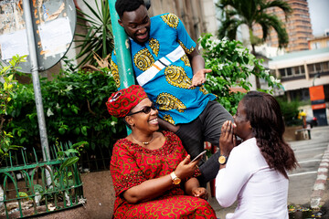 happy beautiful family chatting in the street