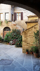 Ancient stone houses in the Italian courtyard
