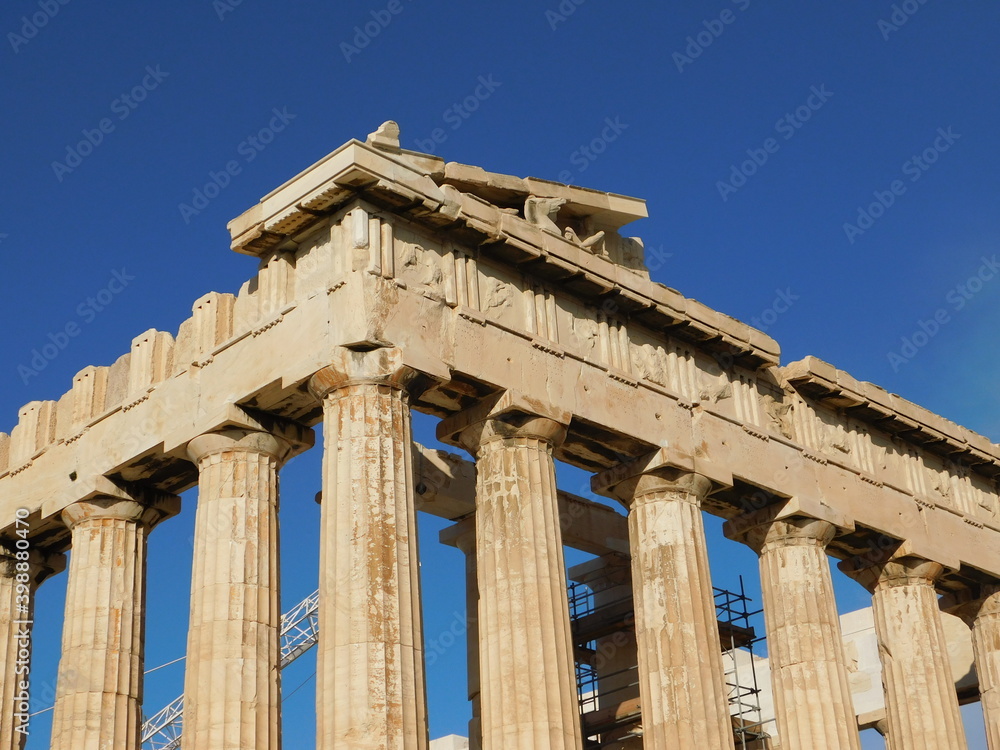 Wall mural corner columns and sculptures of the parthenon, the ancient temple of goddess athena, in athens, gre