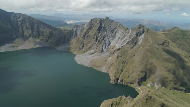 Aerial view crater lake volcano Pinatubo among mountains, Philippines, Luzon. beautiful landscape at Pinatubo mountain crater lake. Travel concept