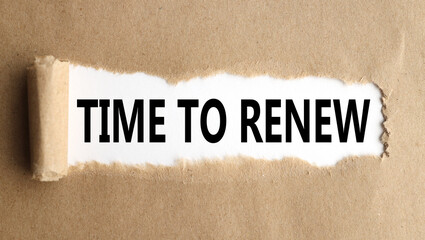 TIME TO RENEW, text on white paper over torn paper background