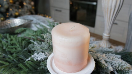 New Year's table, tablecloth, candles, coniferous branches