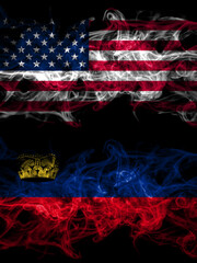 United States of America, America, US, USA, American vs Liechtenstein smoky mystic flags placed side by side. Thick colored silky abstract smoke flags