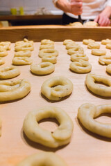 Taralli, typical salty biscuits handmade in southern Italy